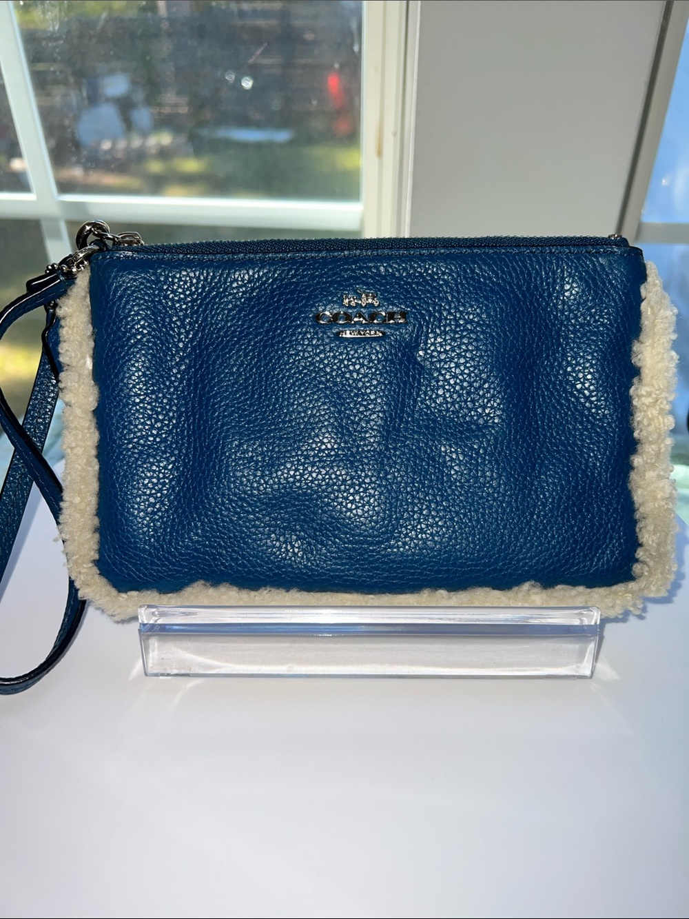 Coach Blue Pebbled Leather Wristlet with Cream Shearling Trim